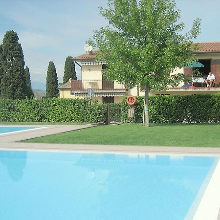 Belvilla By Oyo Enticing Holiday Home With Pool Lazise Eksteriør billede