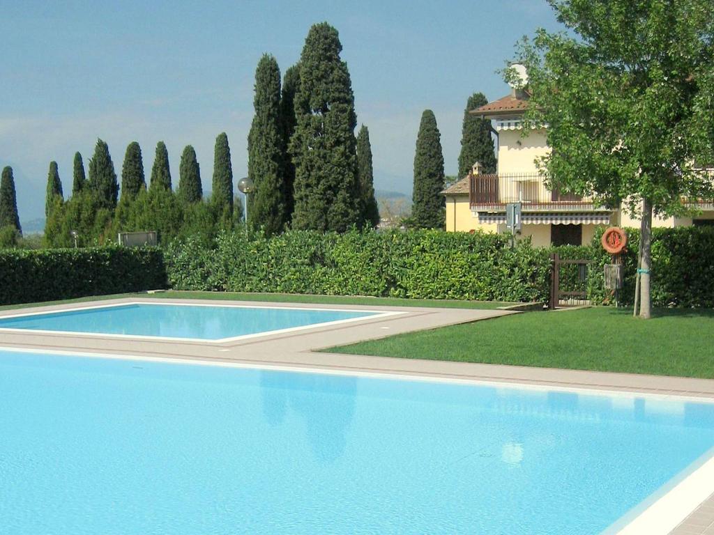 Belvilla By Oyo Enticing Holiday Home With Pool Lazise Eksteriør billede